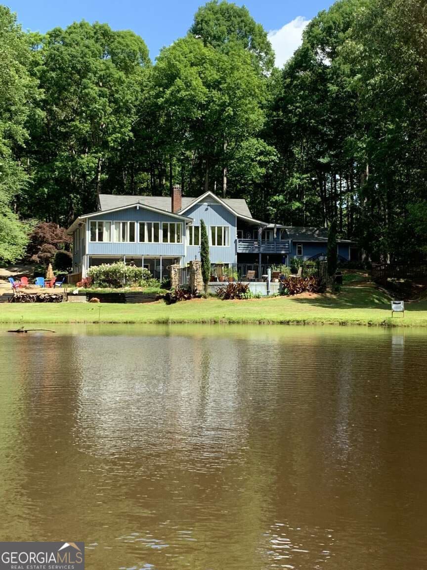 3 bedroom, 4 bathroom, 4,710 sq ft single family residence for sale at 100 Brookshire Drive, Fayetteville, GA 30215 — photo 1 of 45