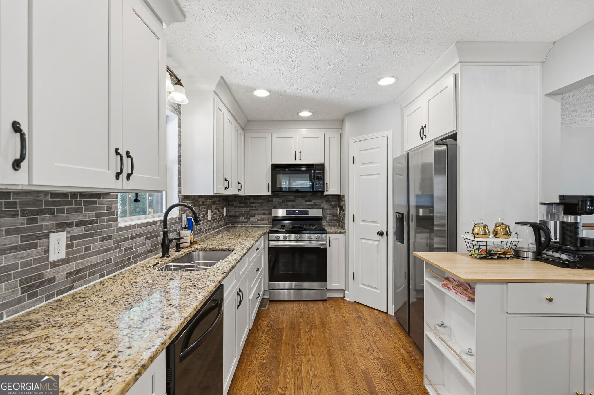 4 bedroom, 2 bathroom, 1,884 sq ft single family residence for sale at 1590 Kimberly Place, Canton, GA 30114 — photo 7