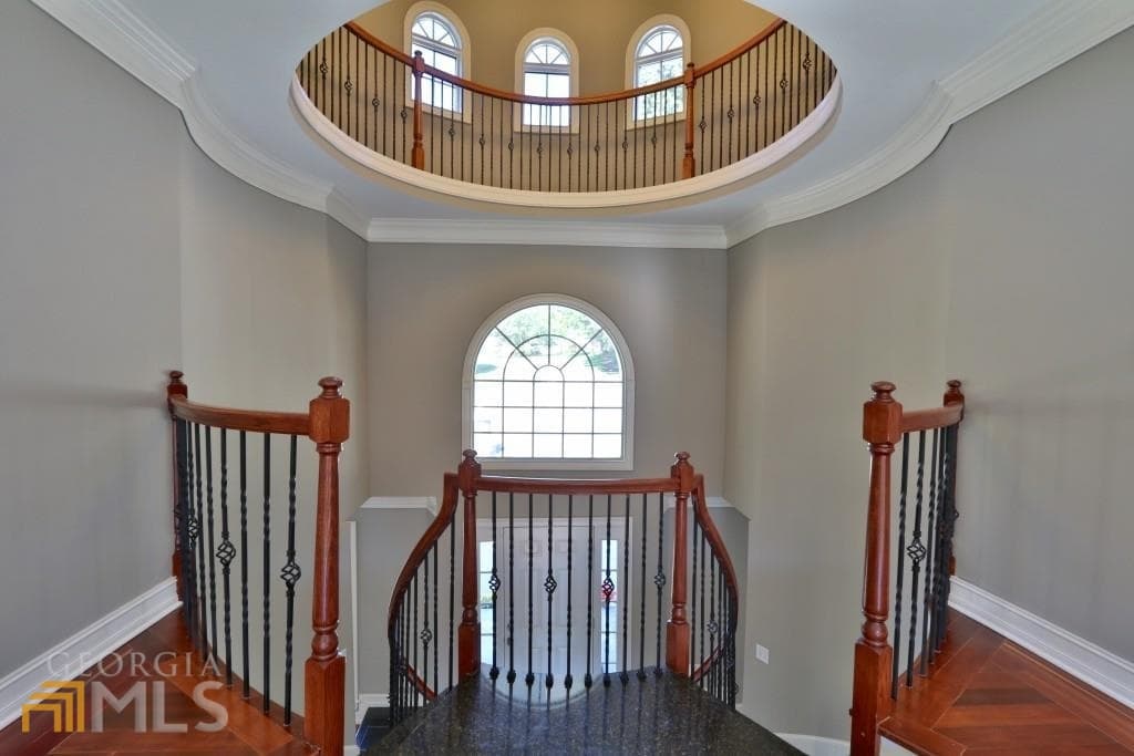 6 bedroom, 5.5 bathroom, 5,959 sq ft single family residence for sale at 910 Woodward Park Drive, Suwanee, GA 30024 — photo 6