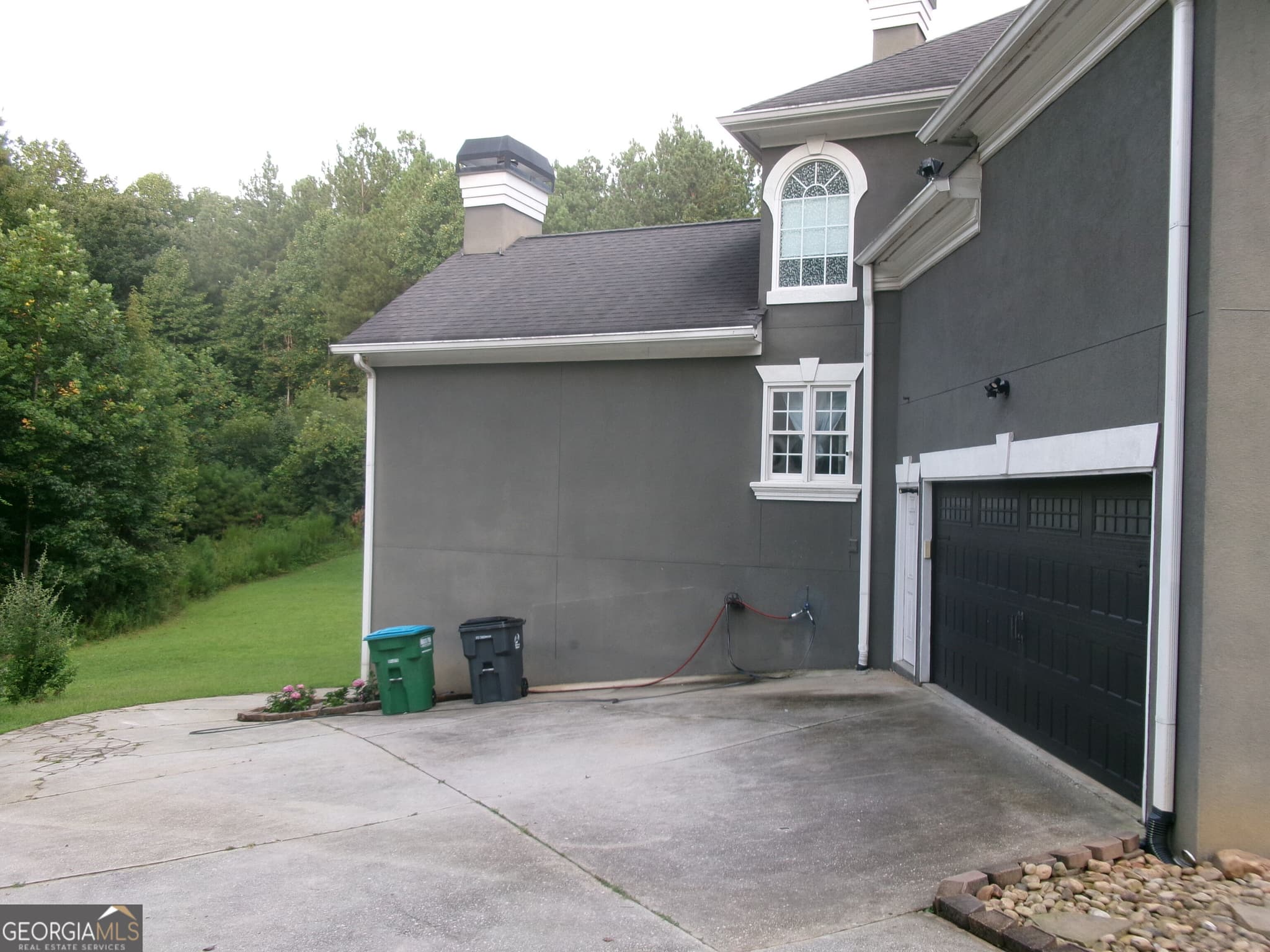 6 bedroom, 5.5 bathroom, 5,959 sq ft single family residence for sale at 910 Woodward Park Drive, Suwanee, GA 30024 — photo 9