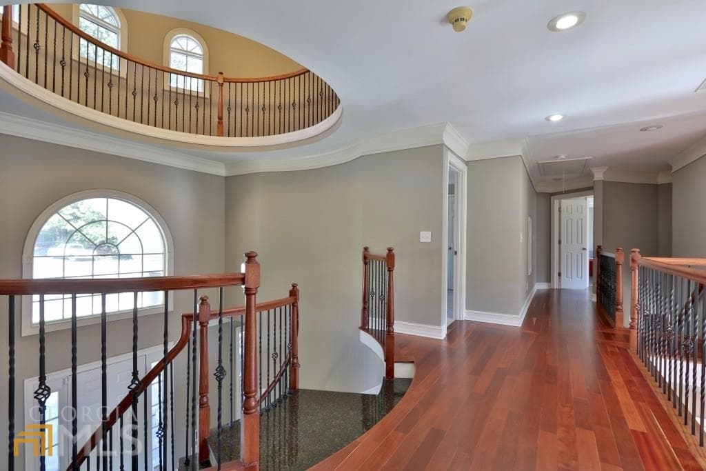 6 bedroom, 5.5 bathroom, 5,959 sq ft single family residence for sale at 910 Woodward Park Drive, Suwanee, GA 30024 — photo 8