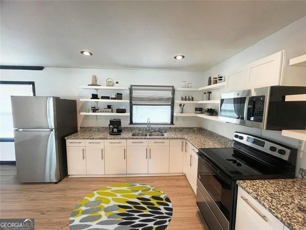 3 bedroom, 2 bathroom, 1,344 sq ft single family residence for sale at 2597 Glenvalley Drive, Decatur, GA 30032 — photo 7
