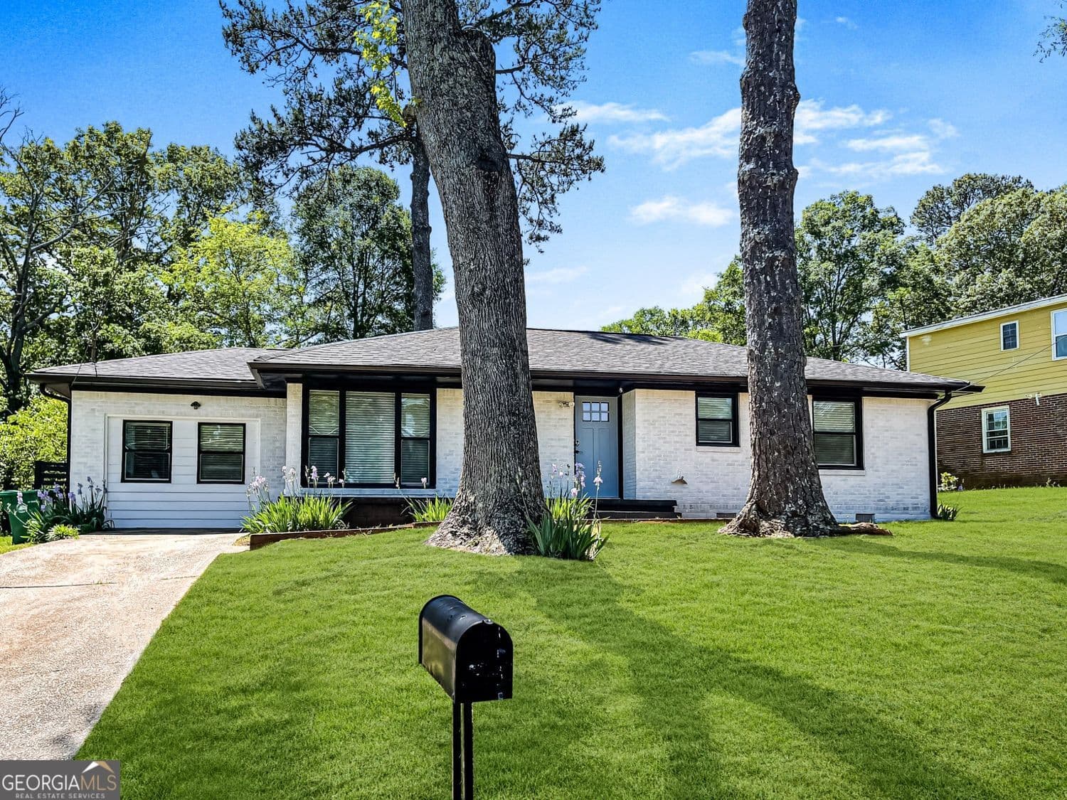 3 bedroom, 2 bathroom, 1,344 sq ft single family residence for sale at 2597 Glenvalley Drive, Decatur, GA 30032 — photo 1 of 23