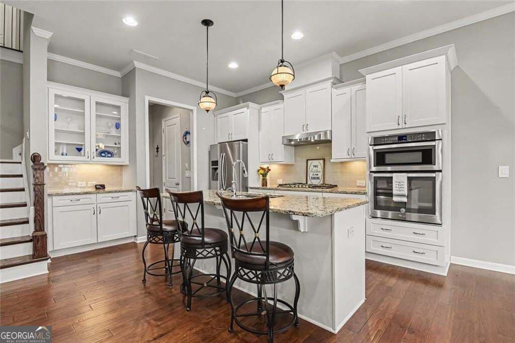3 bedroom, 3.5 bathroom, 3,443 sq ft townhouse for sale at 1011 Milhaven Drive, Roswell, GA 30076 — photo 7