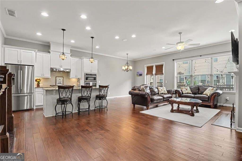 3 bedroom, 3.5 bathroom, 3,443 sq ft townhouse for sale at 1011 Milhaven Drive, Roswell, GA 30076 — photo 5
