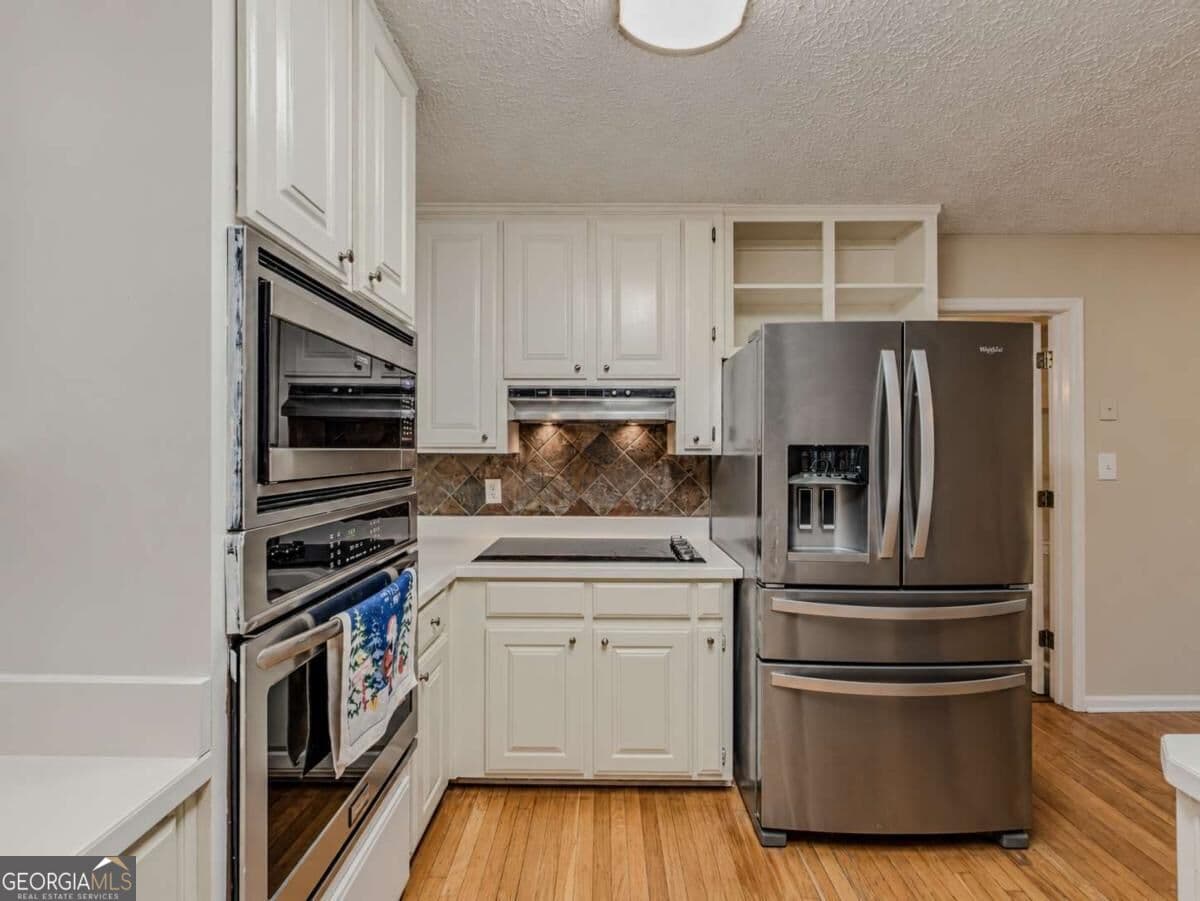 4 bedroom, 2.5 bathroom single family residence for sale at 3381 Longfield Drive, Snellville, GA 30039 — photo 3