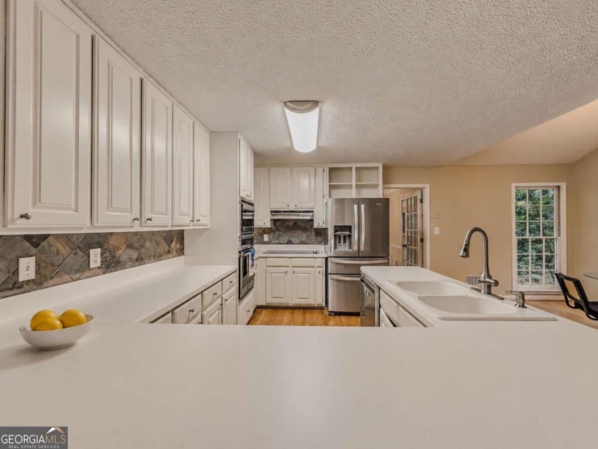 4 bedroom, 2.5 bathroom single family residence for sale at 3381 Longfield Drive, Snellville, GA 30039 — photo 5