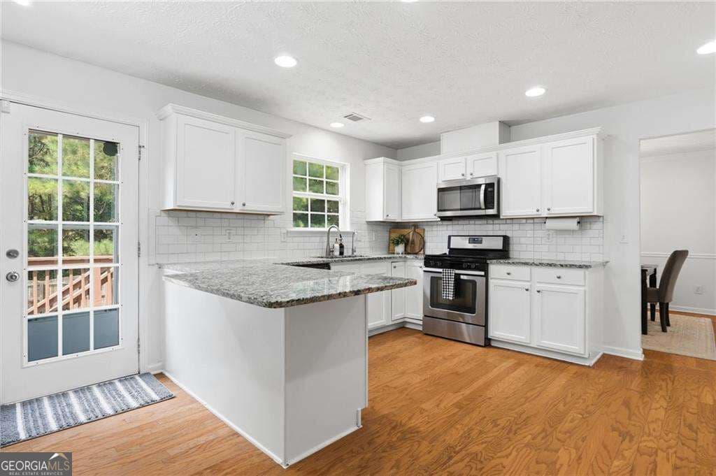 5 bedroom, 3.5 bathroom, 3,658 sq ft single family residence for sale at 5492 Skylar Creek Lane, Buford, GA 30518 — photo 6