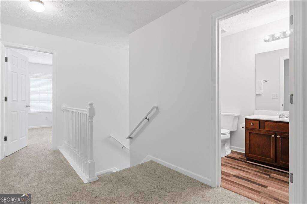 5 bedroom, 3.5 bathroom, 3,658 sq ft single family residence for sale at 5492 Skylar Creek Lane, Buford, GA 30518 — photo 9