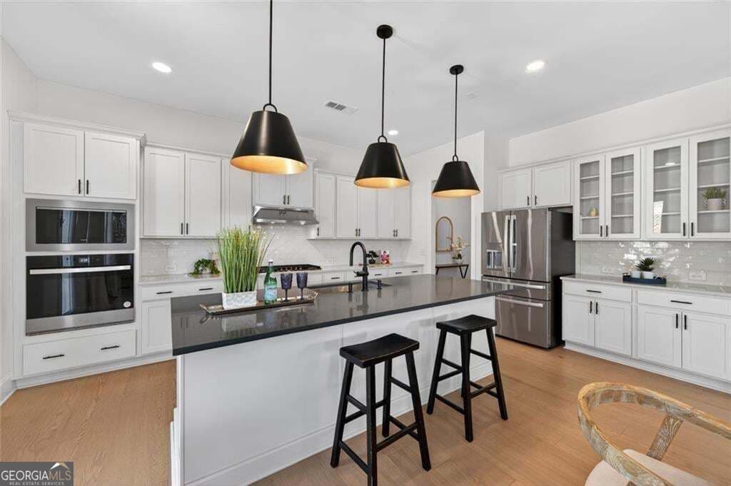 5 bedroom, 4 bathroom, 3,415 sq ft single family residence for sale at 5014 Baywood Lane, Woodstock, GA 30188 — photo 3