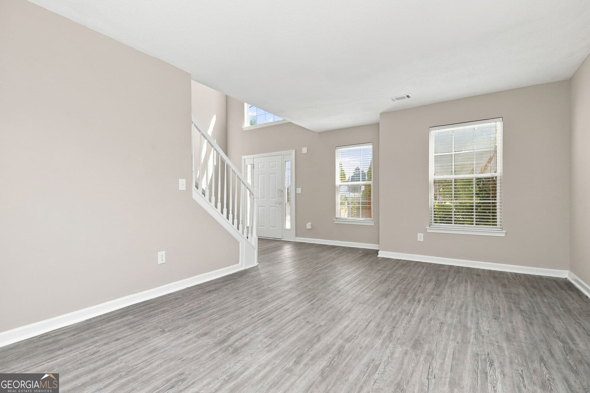 6 bedroom, 3 bathroom, 3,606 sq ft single family residence for sale at 406 Grier Drive, Locust Grove, GA 30248 — photo 2