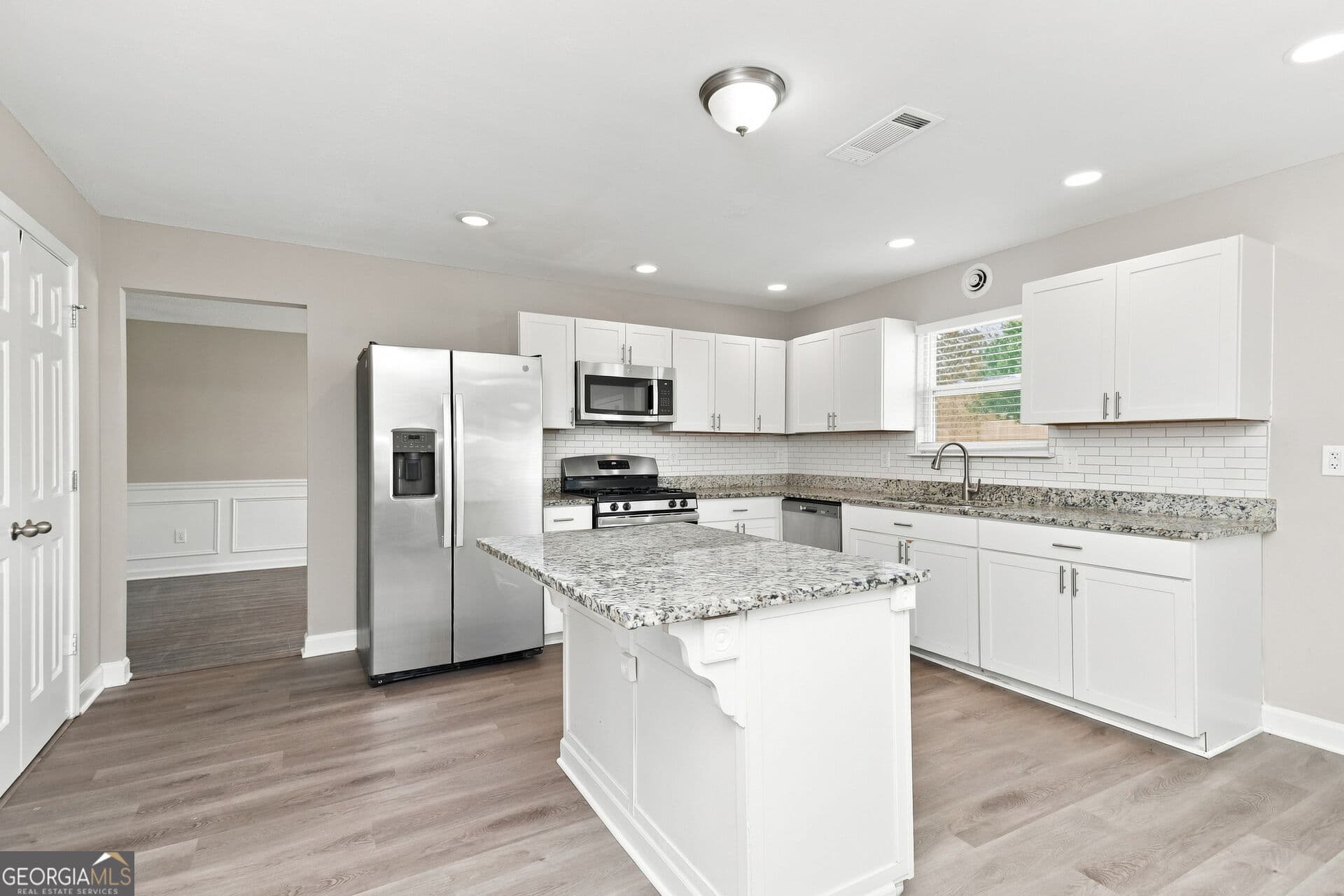 6 bedroom, 3 bathroom, 3,606 sq ft single family residence for sale at 406 Grier Drive, Locust Grove, GA 30248 — photo 6