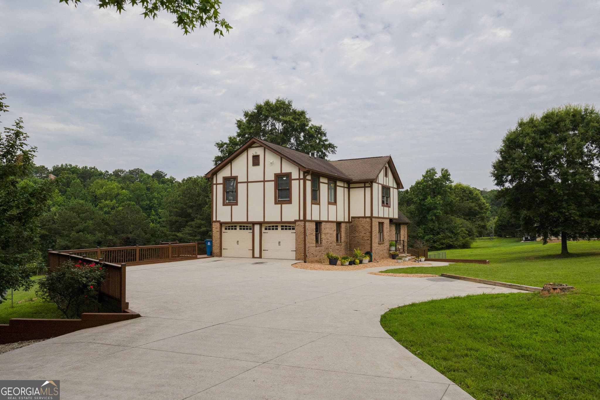 4 bedroom, 5 bathroom, 4,016 sq ft single family residence for sale at 744 Alcovy Way, Lawrenceville, GA 30043 — photo 2