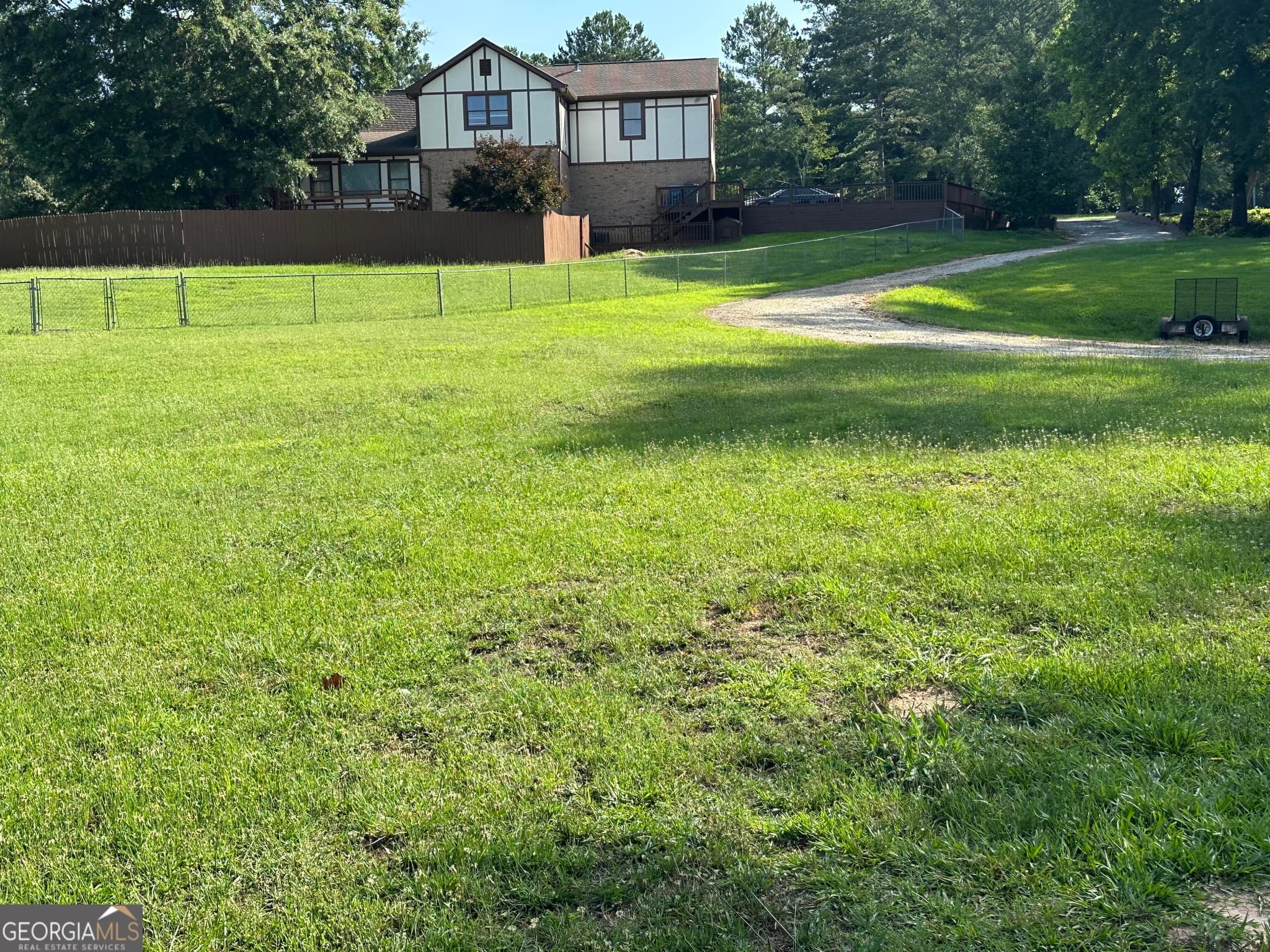 4 bedroom, 5 bathroom, 4,016 sq ft single family residence for sale at 744 Alcovy Way, Lawrenceville, GA 30043 — photo 4