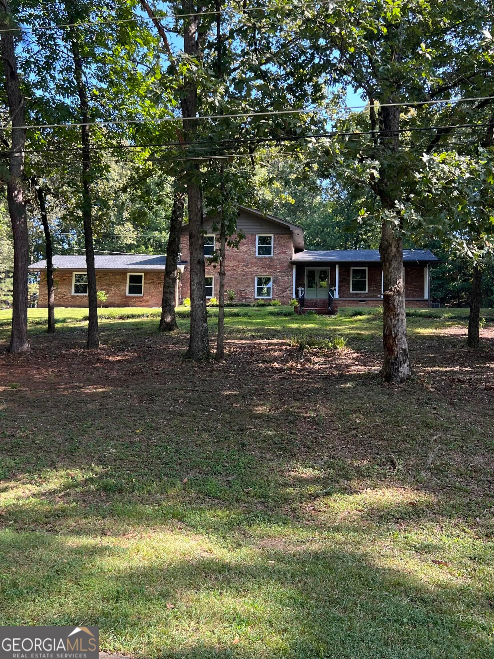 4 bedroom, 3.5 bathroom, 2,468 sq ft single family residence for sale at 203 Woodland Drive, Calhoun, GA 30701 — photo 2