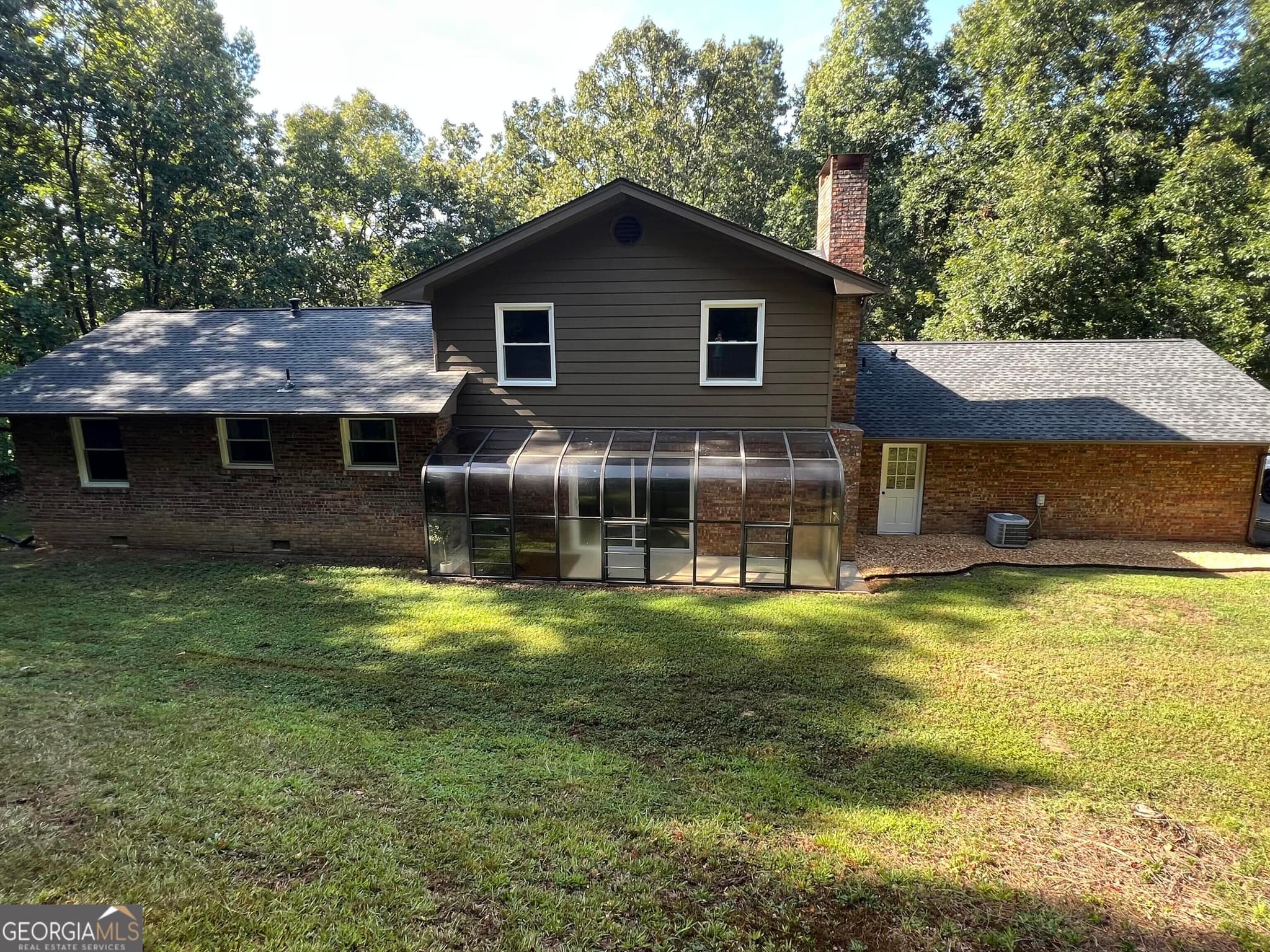 4 bedroom, 3.5 bathroom, 2,468 sq ft single family residence for sale at 203 Woodland Drive, Calhoun, GA 30701 — photo 3