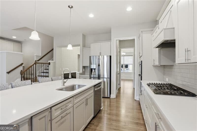 7 bedroom, 5.5 bathroom, 6,192 sq ft single family residence for sale at 3813 Whithorn Way, Kennesaw, GA 30152 — photo 6