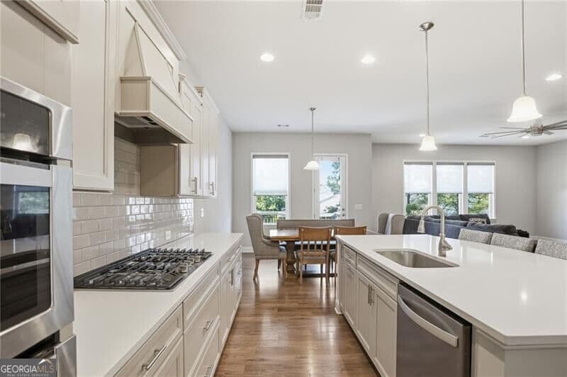 7 bedroom, 5.5 bathroom, 6,192 sq ft single family residence for sale at 3813 Whithorn Way, Kennesaw, GA 30152 — photo 7