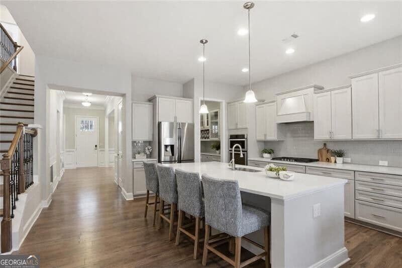 7 bedroom, 5.5 bathroom, 6,192 sq ft single family residence for sale at 3813 Whithorn Way, Kennesaw, GA 30152 — photo 9