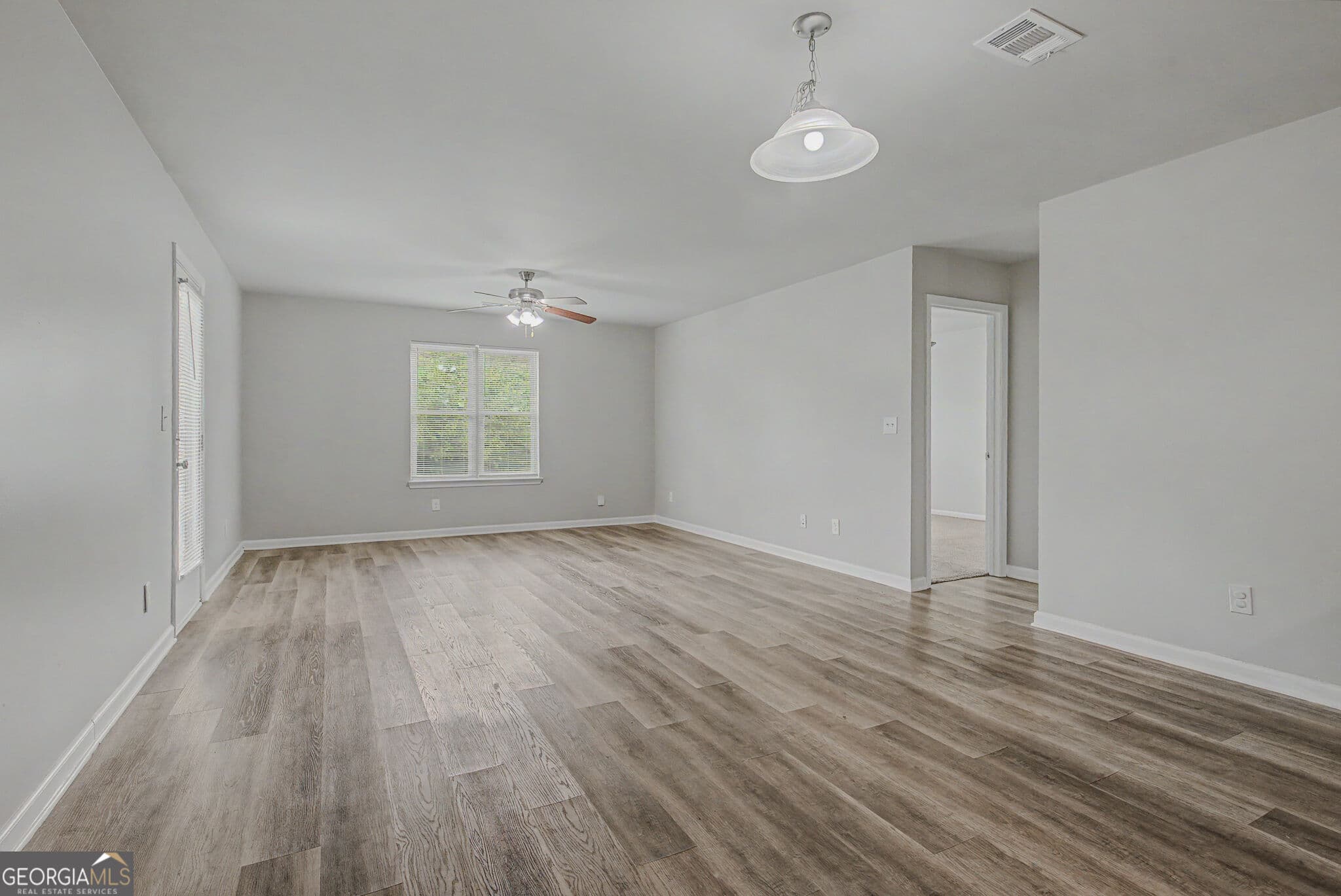 4 bedroom, 3 bathroom, 2,139 sq ft single family residence for sale at 123 W Lexington Avenue, Griffin, GA 30223 — photo 5
