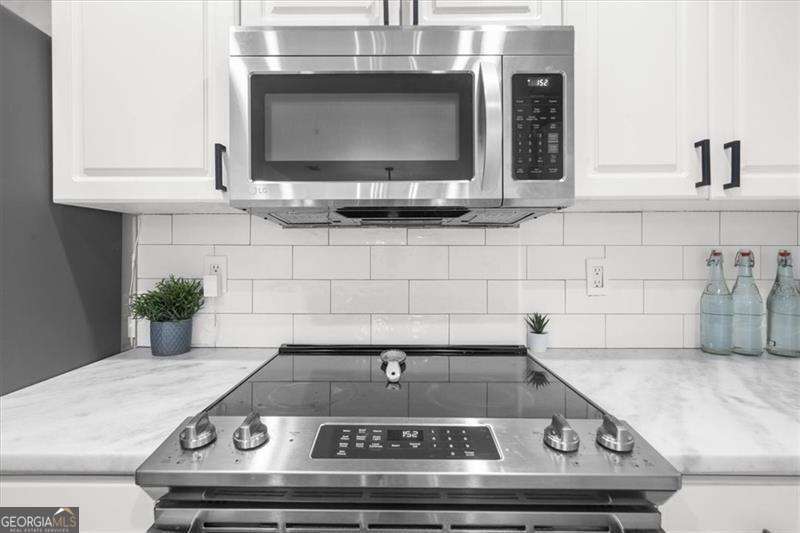 1 bedroom, 1.5 bathroom, 1,012 sq ft condominium for sale at 3475 Oak Valley Road 410, Atlanta, GA 30326 — photo 7