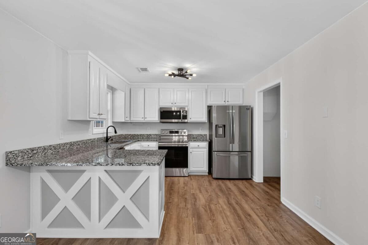4 bedroom, 3 bathroom, 1,395 sq ft single family residence for sale at 2032 Emerald Pointe Drive, Winder, GA 30680 — photo 9