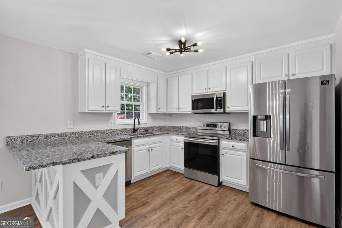 4 bedroom, 3 bathroom, 1,395 sq ft single family residence for sale at 2032 Emerald Pointe Drive, Winder, GA 30680 — photo 10