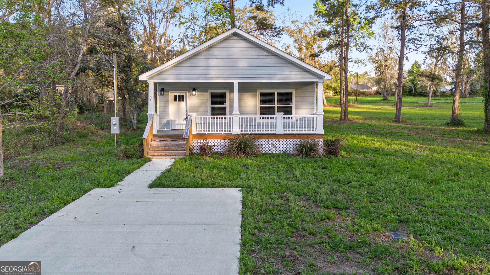 3 bedroom, 2 bathroom, 1,296 sq ft single family residence for sale at 54 SW Pear Street, Ludowici, GA 31316 — photo 2