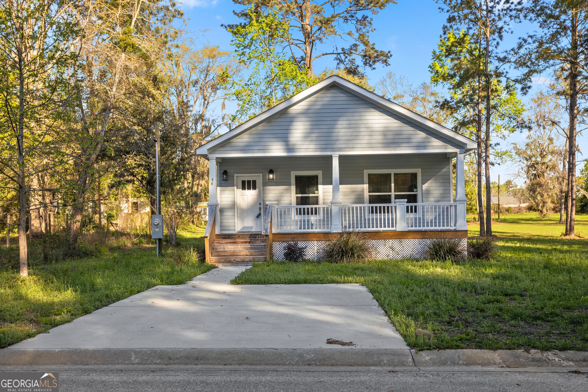 3 bedroom, 2 bathroom, 1,296 sq ft single family residence for sale at 54 SW Pear Street, Ludowici, GA 31316 — photo 3