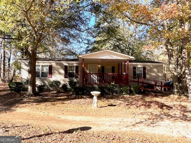 3 bedroom, 2 bathroom, 1,248 sq ft manufactured home,single family residence for sale at 3195 Henderson Grove Road, Sandersville, GA 31082 — photo 4