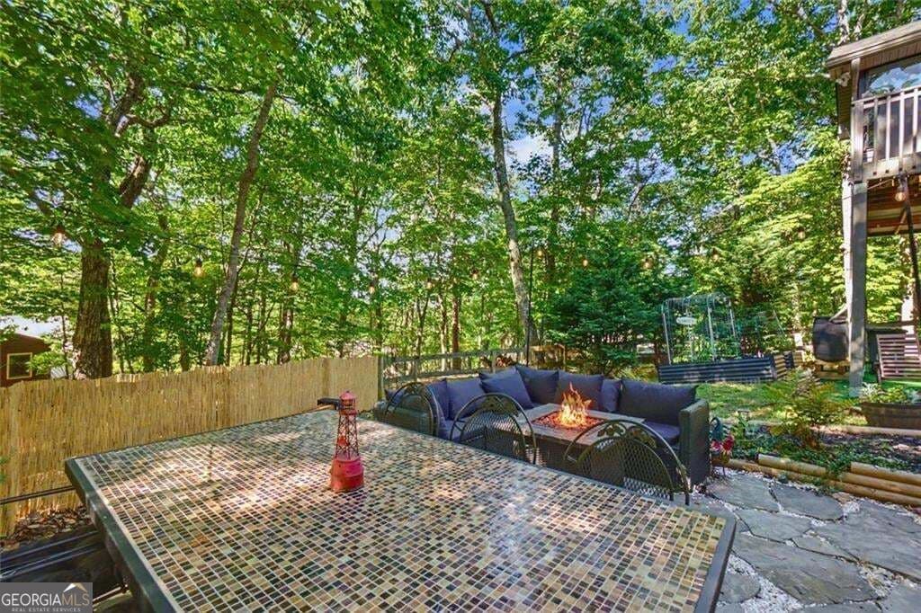 3 bedroom, 2 bathroom, 1,555 sq ft single family residence for sale at 80 Camelot Way, Jasper, GA 30143 — photo 4