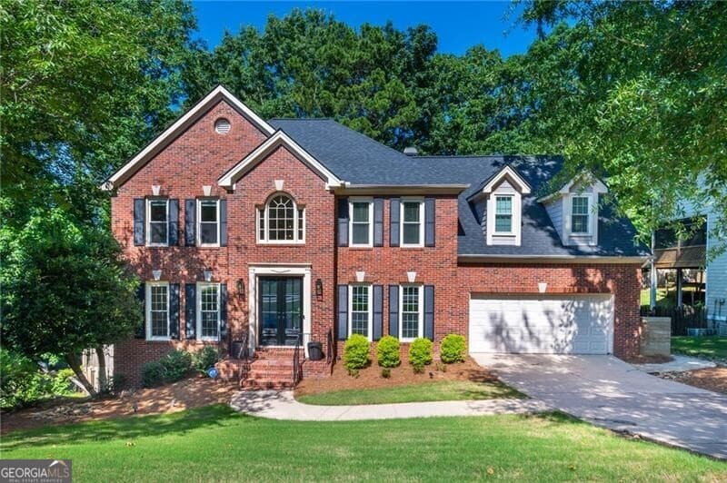 5 bedroom, 3.5 bathroom, 4,373 sq ft single family residence sold at 10815 Donamere Drive, Johns Creek, GA 30022