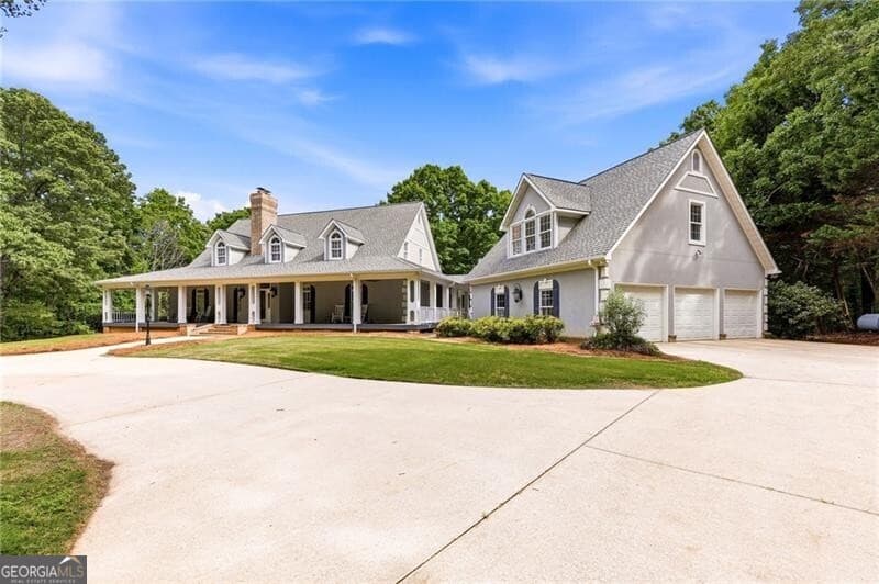 4 bedroom, 4.5 bathroom, 7,821 sq ft single family residence for sale at 4264 Joe Chandler Road, Gillsville, GA 30543 — photo 6