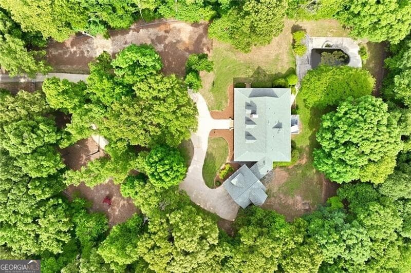 4 bedroom, 4.5 bathroom, 7,821 sq ft single family residence for sale at 4264 Joe Chandler Road, Gillsville, GA 30543 — photo 7