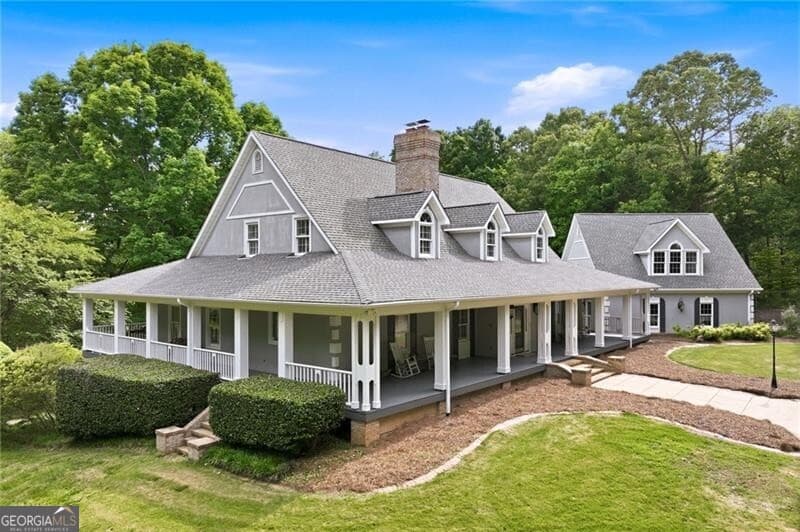 4 bedroom, 4.5 bathroom, 7,821 sq ft single family residence for sale at 4264 Joe Chandler Road, Gillsville, GA 30543