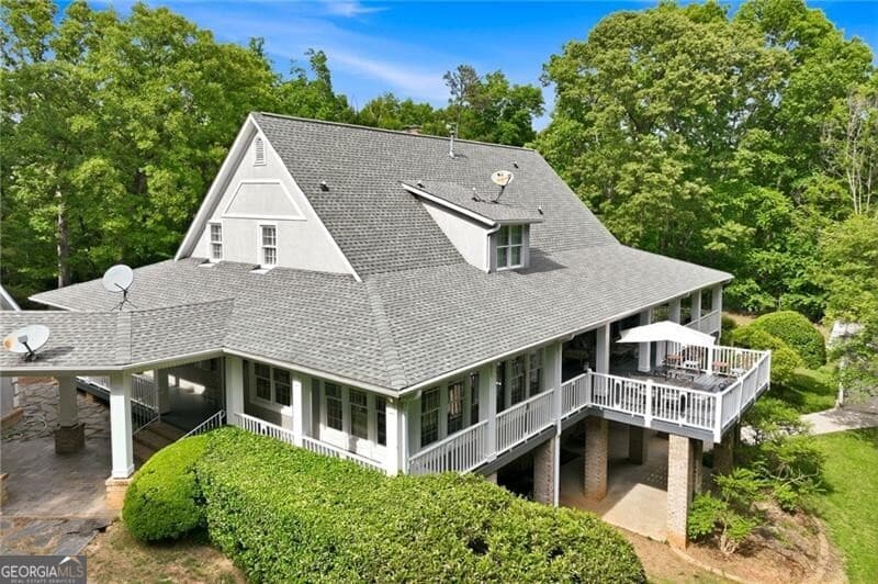 4 bedroom, 4.5 bathroom, 7,821 sq ft single family residence for sale at 4264 Joe Chandler Road, Gillsville, GA 30543 — photo 10