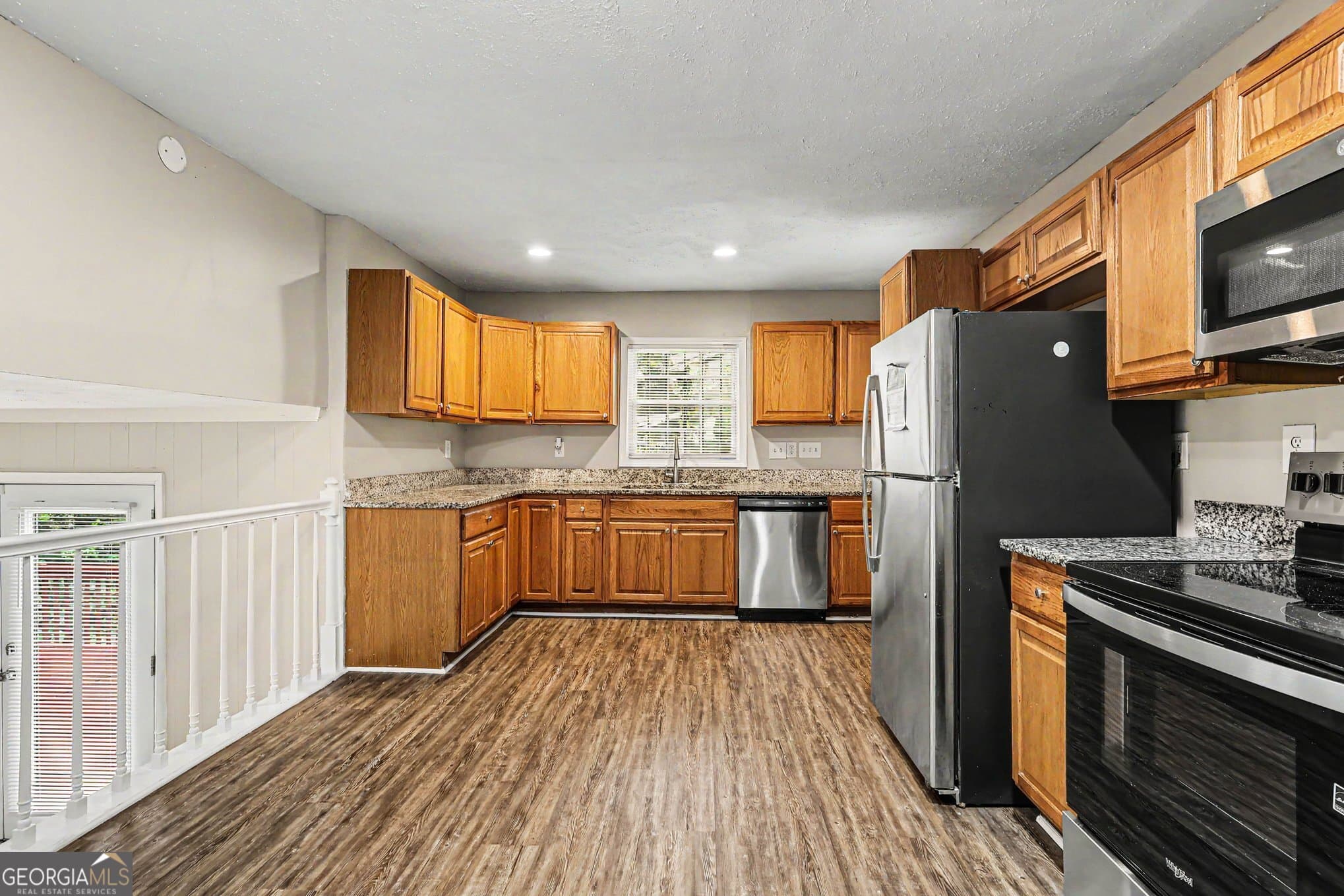 5 bedroom, 3 bathroom, 2,393 sq ft single family residence for sale at 3348 Goldenchain Drive, Lithonia, GA 30038 — photo 9