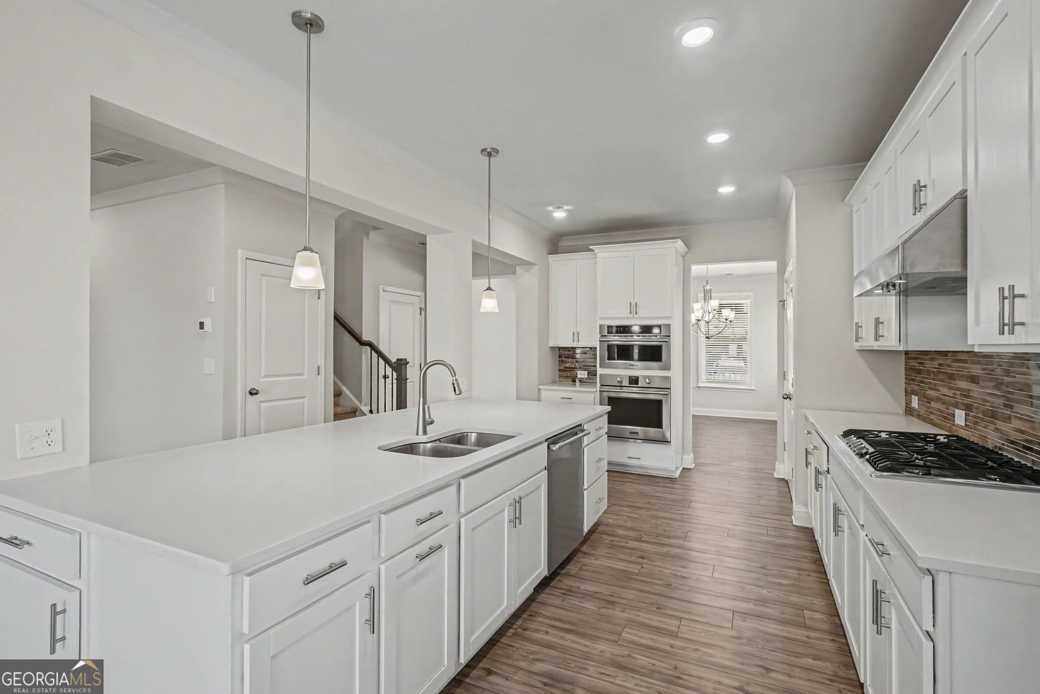 5 bedroom, 2.5 bathroom, 3,078 sq ft single family residence for sale at 350 Gardens Of Harmony Drive, Canton, GA 30115 — photo 7