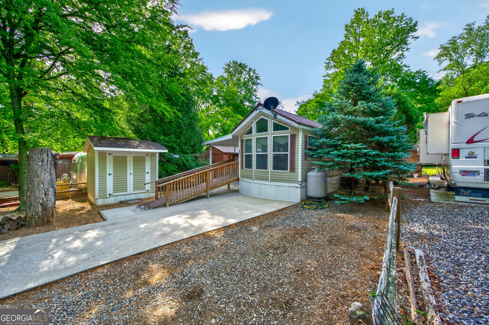 2 bedroom, 2 bathroom manufactured home,single family residence for sale at 107 Riverside Place, Cleveland, GA 30528 — photo 2