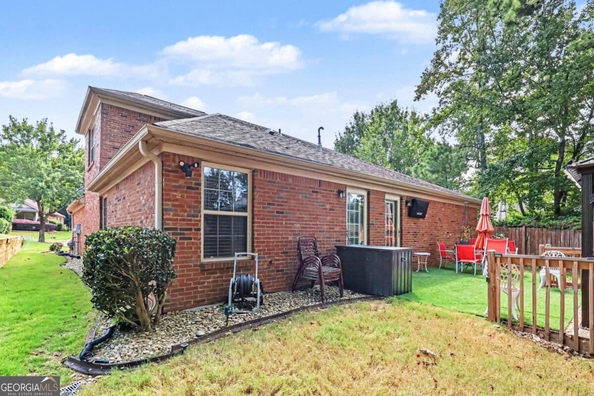 4 bedroom, 3 bathroom, 2,174 sq ft single family residence for sale at 8001 Gossamer Drive, Fairburn, GA 30213 — photo 3