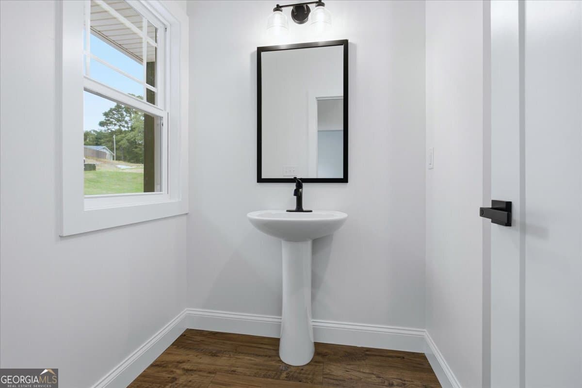 4 bedroom, 2.5 bathroom, 2,618 sq ft single family residence for sale at 2470 Fischer Road, Sharpsburg, GA 30277 — photo 6