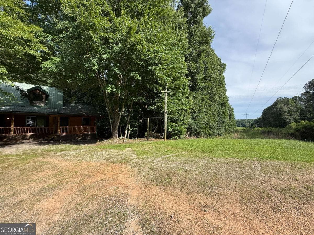 4 bedroom, 3 bathroom, 3,200 sq ft cabin,single family residence for rent at 2405 Mountain Road, Alpharetta, GA 30004 for $2,500 a month — photo 2