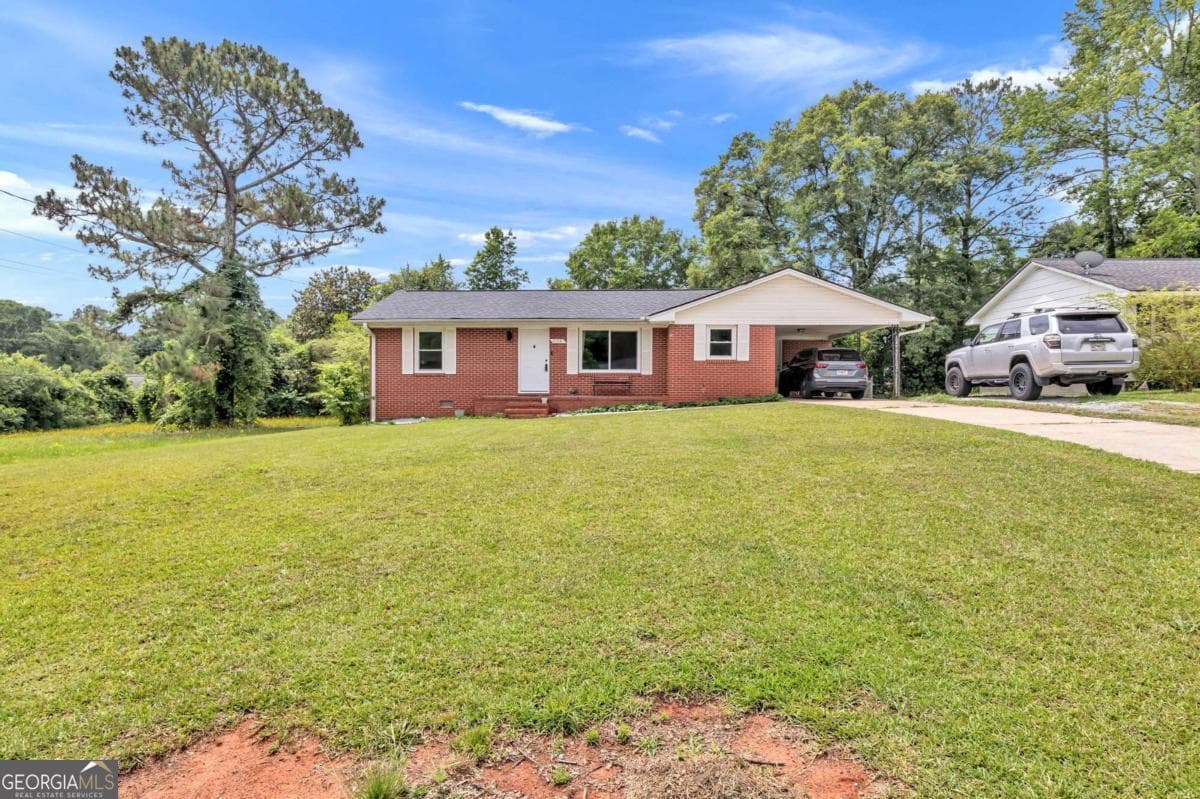 3 bedroom, 2 bathroom, 1,055 sq ft single family residence for sale at 1104 Parkview Drive, Griffin, GA 30224 — photo 2
