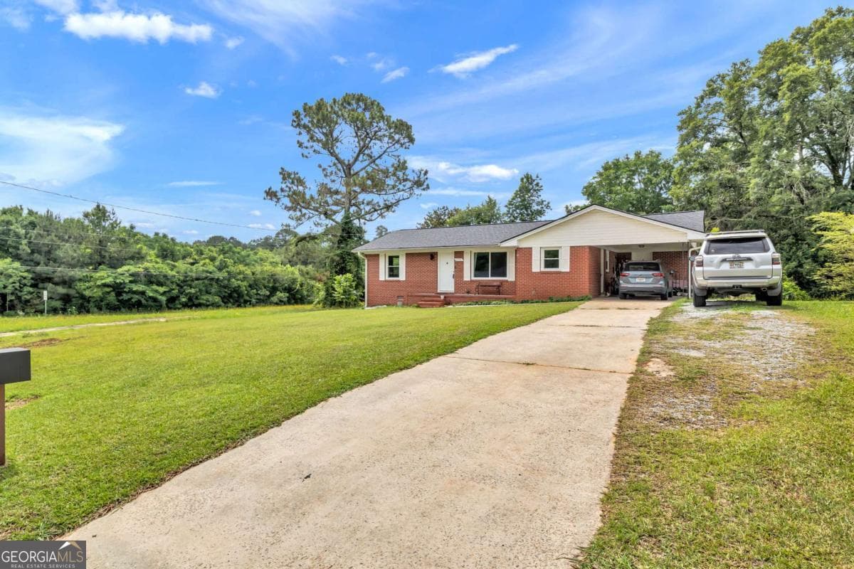 3 bedroom, 2 bathroom, 1,055 sq ft single family residence for sale at 1104 Parkview Drive, Griffin, GA 30224 — photo 1 of 22