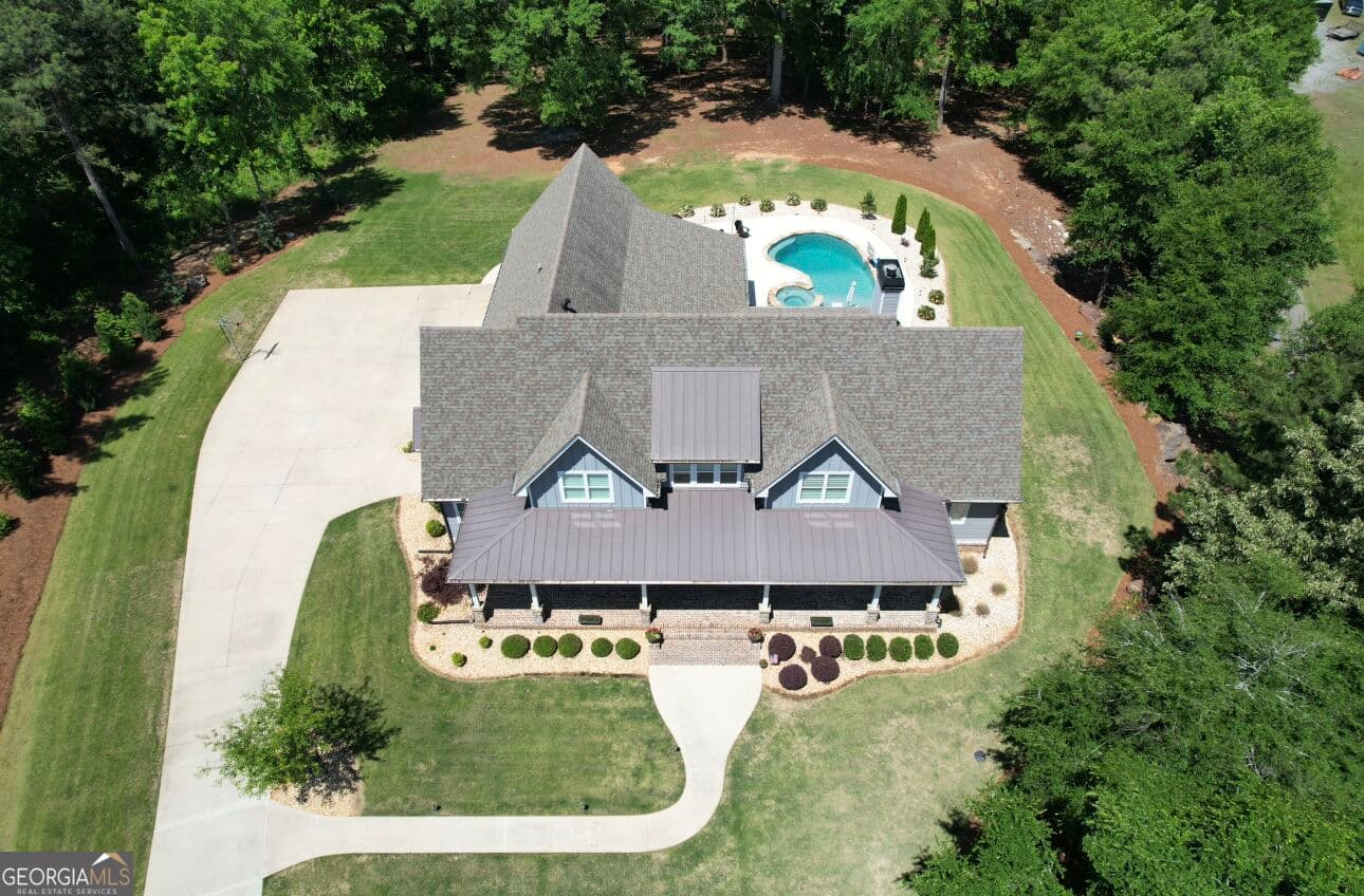4 bedroom, 4.5 bathroom, 4,238 sq ft single family residence for sale at 345 Huff Creek Road, Williamson, GA 30292