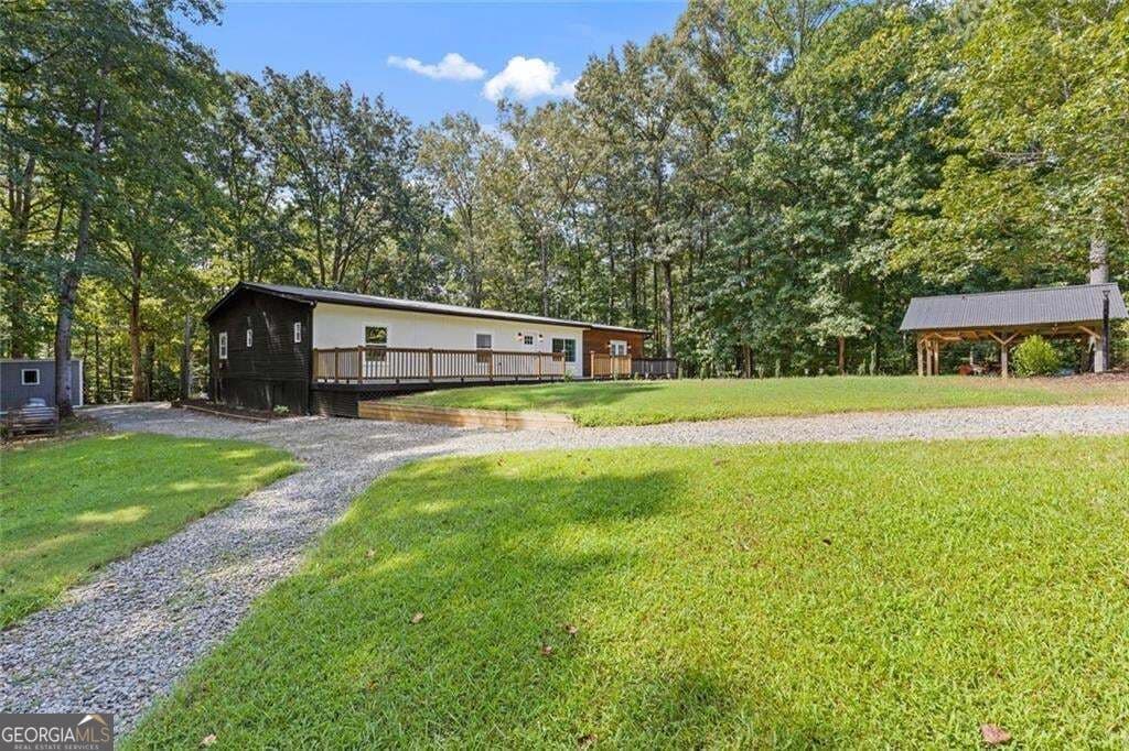 4 bedroom, 2.5 bathroom, 1,972 sq ft single family residence for sale at 681 Pumpkinvine Road, Acworth, GA 30101 — photo 2