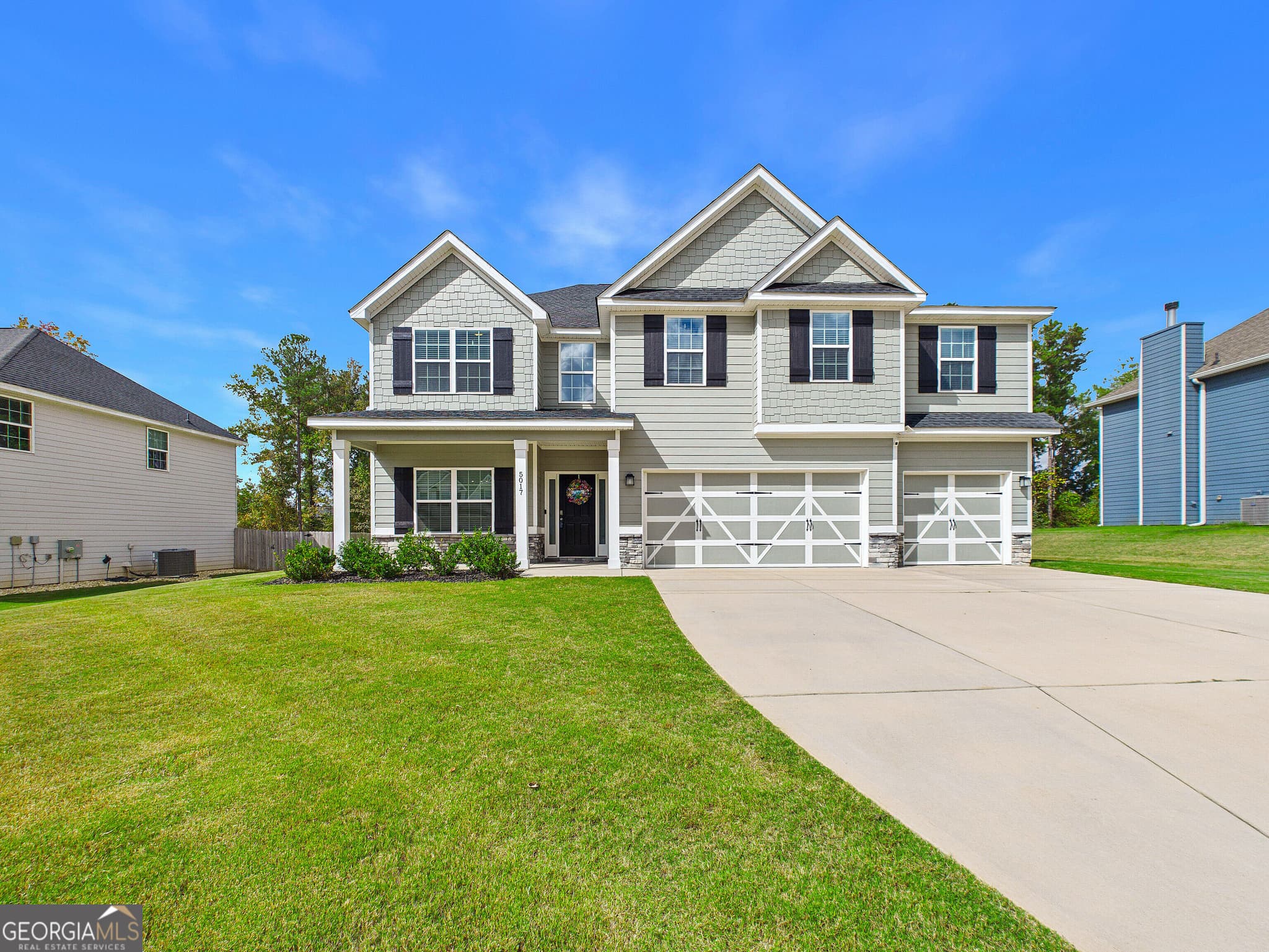 5 bedroom, 3 bathroom, 3,158 sq ft single family residence for sale at 5017 Tybalt Run, Forsyth, GA 31029 — photo 2