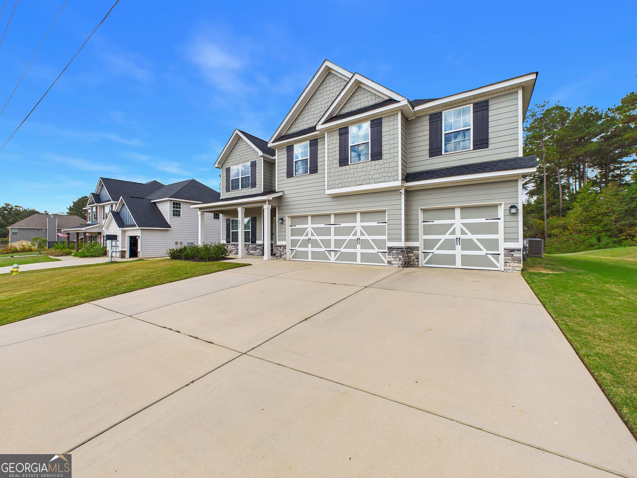 5 bedroom, 3 bathroom, 3,158 sq ft single family residence for sale at 5017 Tybalt Run, Forsyth, GA 31029 — photo 6