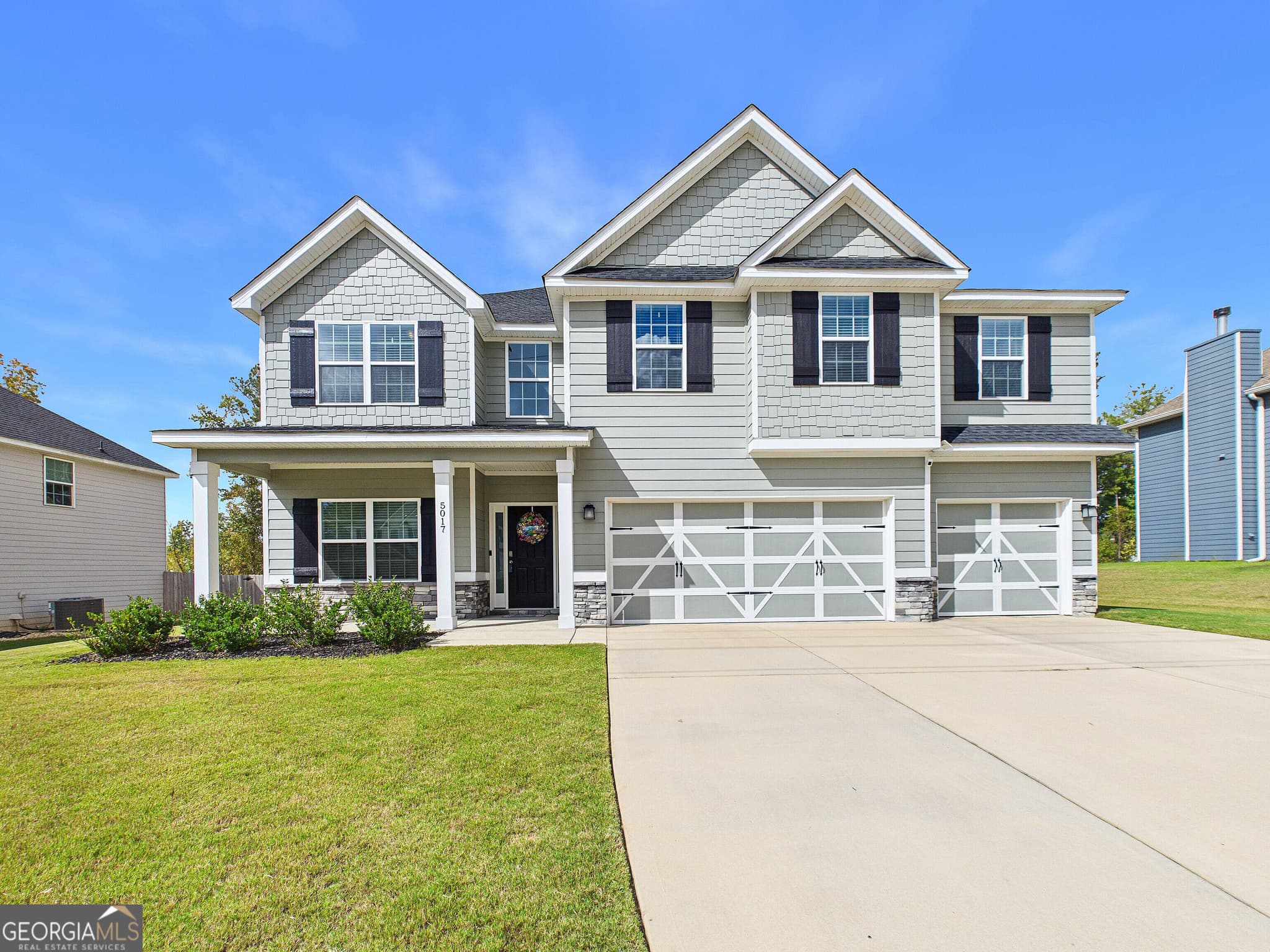 5 bedroom, 3 bathroom, 3,158 sq ft single family residence for sale at 5017 Tybalt Run, Forsyth, GA 31029 — photo 3