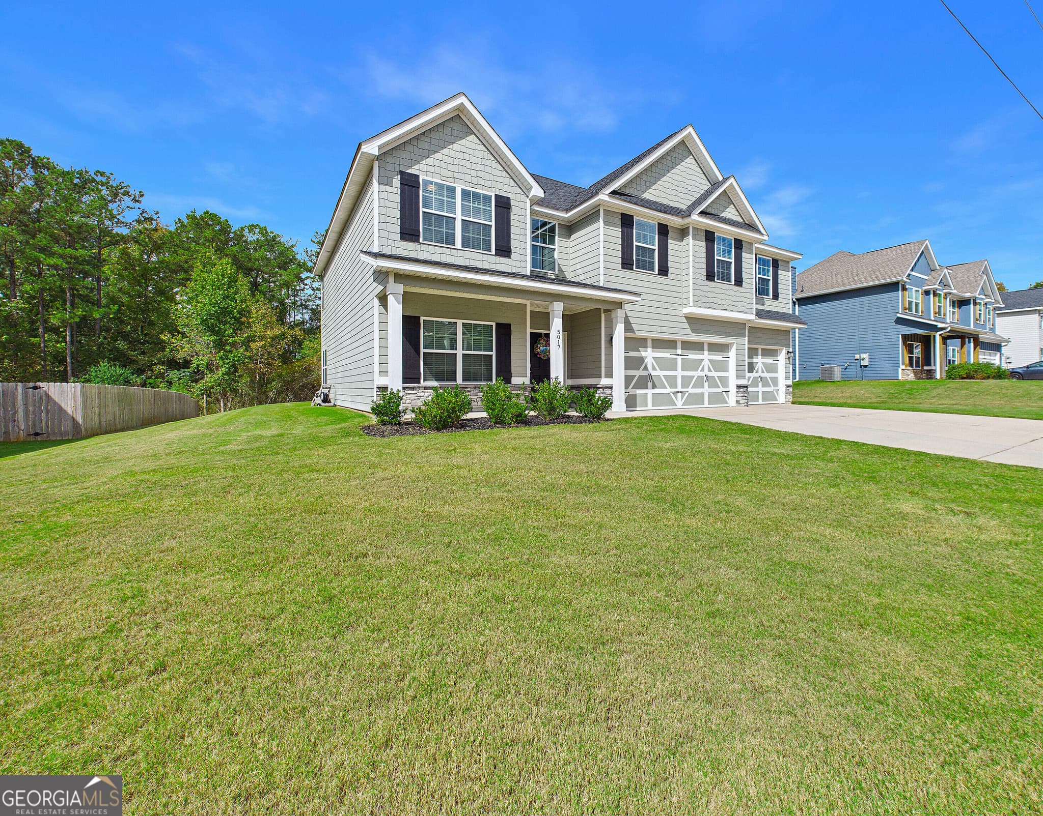 5 bedroom, 3 bathroom, 3,158 sq ft single family residence for sale at 5017 Tybalt Run, Forsyth, GA 31029 — photo 5